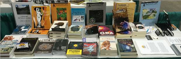 a table displaying books and magazines about disability