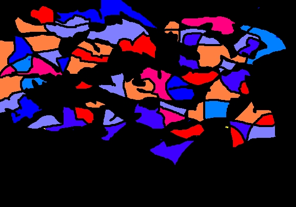 Design of broken red, orange and blue puzzle pieces on black background