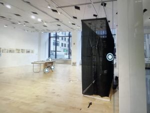 Color photograph of the Warrior Brain + Artist Mind Exhibit (CreatiVets, June 2018), showing various artists’ work in the gallery—including John T. Gibson’s “The Sapper’s Abyss.”