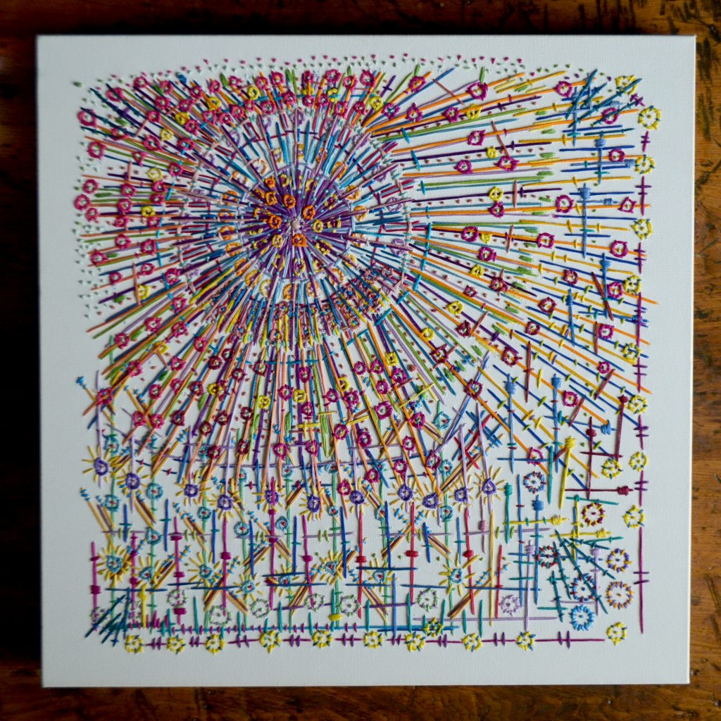 "Sun Burst" is an abstract embroidery piece that was hand embroidered onto white artist canvas, using nontraditional embroidery stitches. It measures 20"x20". “Sun Burst” looks like an explosion of embroidery thread. The epicenter of this explosion, in the upper-left third of the two foot square canvas, is a mass of boldly embroidered purple and maroon lines, radiating out from a small, dark pink center. As the lines extend further, they become longer and more sparse, revealing more of the white canvas between them. The colors change to a lighter purple and blue, then yellow and green, and finally yellow and blue. Littered along these lines, throughout the piece, are small circles, which range in color from orange at the epicenter, to light purple, and then to red. These can be imagined as smaller explosions, like those at the end of a larger firework’s trail. Along the top and top-left borders of the embroidery are groupings of single knots in red and lime. Along the bottom and right of the embroidery, there is an edge consisting of alternating red lines and yellow circles, as the thread burst dissipates. All this is framed by a one- to one-and-a-half inch border of blank white canvas, framing the embroidery to the physical edge of the piece."
