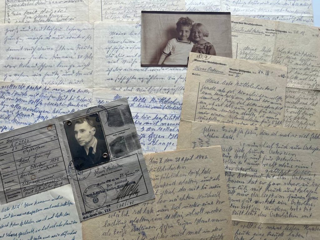 Various black and white photographs, letters, and personal documents belonging to Hans Heinrich Festersen, including an ID with his photo, a photo of him in childhood with his sister, and handwritten letters he wrote to his sister from prison.