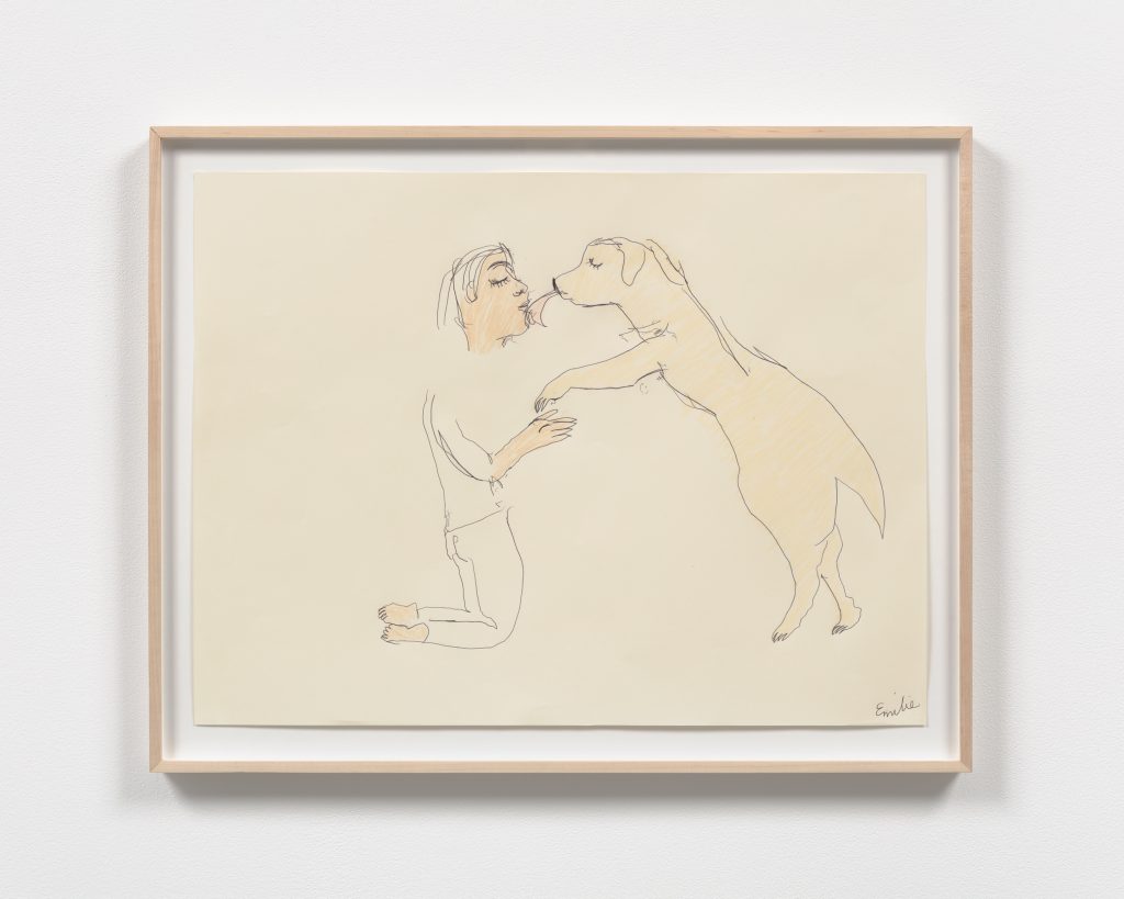 “The Kiss”. Emilie and London are in the center of the drawing. Emilie is on the left side, kneeling down on her knees, with her hands holding up London’s front paws as London stands up on her hind legs to lick Emilie’s mouth with her pink tongue.